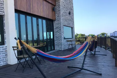 Jeju Barame Seuchiunda Отели рядом с достопримечательностью «Остров Удо»