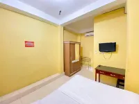 Damigalova Guest House Mitra RedDoorz Hotels in Rawa Sari