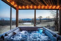 Lux Hot Tub, Outdoor Movie Screen, Pond, and Fire Pit