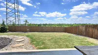 Spacious home near Austin with a large backyard perfect for enjoying sunsets.