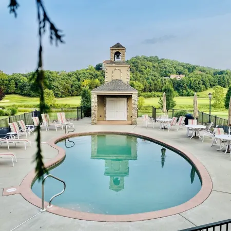 Nestled by the 7th green, large deck areas. Movie theatre for inside or out.