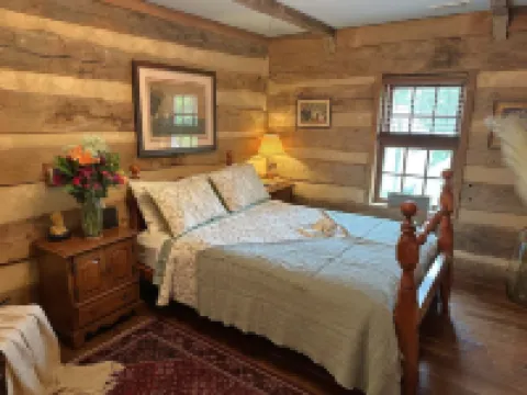 Historic Log Cabin fully restored; gourmet kitchen & much more!