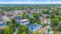 Luxury 2 Bedroom 1.5 Bath Town Home/ Walk to Elmwood/ Garage/ EV Charger/ AC