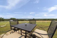 Lake view house with expansive views, fireplace, walk in showers, Ember mugs.