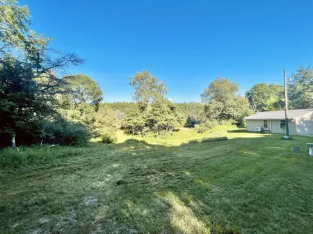 Cabin with beautiful acreage bordering Manistee National Forest
