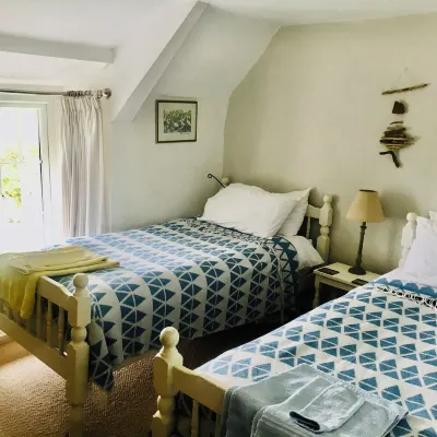 A beautiful 250 year old thatched cottage close to Frenchman's Creek. 2 bedrooms