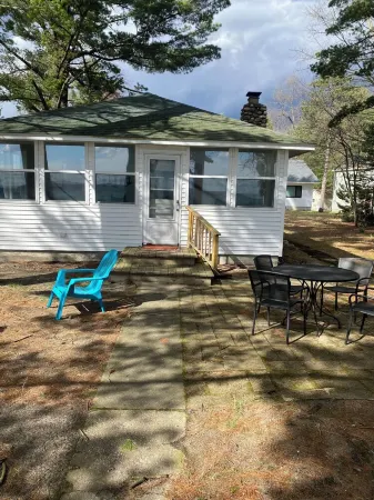 Lakefront Cabin on Higgins Lake.  Only steps from the water! boat buoy available