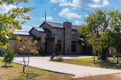 Large Modern home nestled in Alvarado! Hot Tub & Theater Hotels near Shepherd's Valley Cowboy Church and Arena Complex