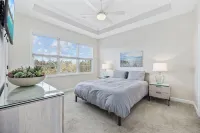 Modern Golf-View Condo • Barefoot Resort • Pools • Beach Gear Included