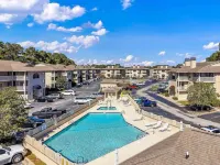 Quiet Condo with King Suite 4 Miles from the Beach,Private Balcony,Pool Hot Tub.