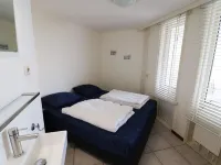 Nice House on the Golf Course with Sauna Hotels in Hollum