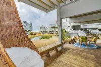 Walk to the beach or pool in this cozy villa. 2 deck spaces with 2 golf carts for enjoyment