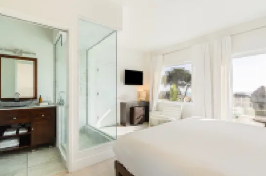 Charming Coastal Retreat with Firepit Lounge - Bright and Inviting Escape