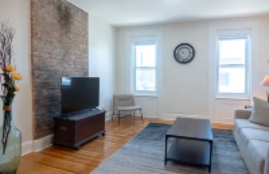 Spacious Living Room and High-Speed Wifi - Inviting Urban Retreat