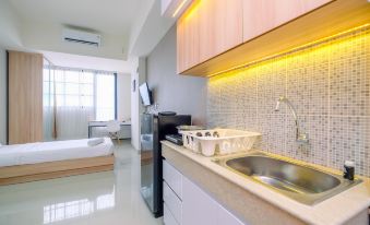 Minimalist Studio Room at Evenciio Margonda Apartment