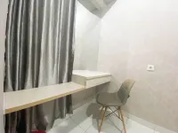 Elegant and Homey Studio at Amartha View Apartment
