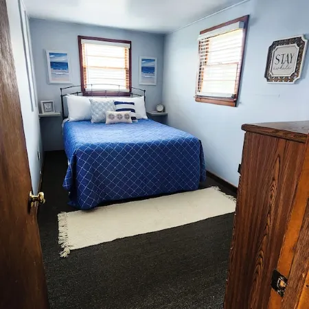 Cozy cabin on Little McDonald with amazing walk out beach!