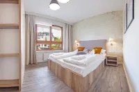 陽光和雪水瓶座公寓飯店