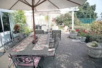 Roosboom Guest Apartments Hotels near Contour Enviro Group