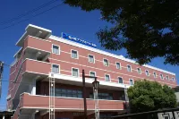 Ryugasaki Plaza Hotel Shinkan Отели в г. Индзай
