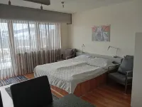 Friendly 1-room apartment with terrace and panoramic view.