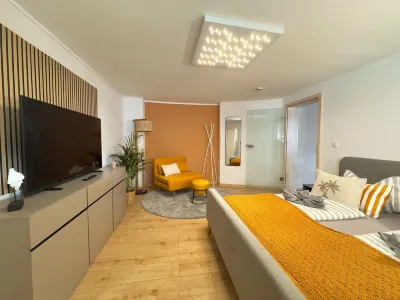 Apartment in the Beachhouse on Lake Goitzsche/2 min. to the beach, barbecue area in the garden