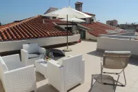 Top floor penthouse apartment with terrace in the historical center, 3 km from the beach