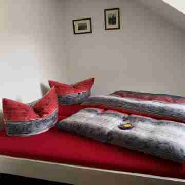 Small, simple attic apartment Rooms