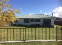 Corena's Place - walking distance to lake and town.  Includes linen and wifi.
