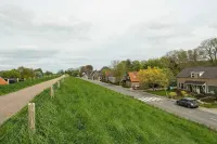 Characteristic farmhouse on the dike