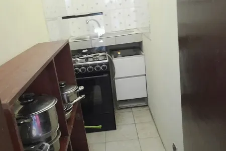 Nzecy Appart. A studio with a velvety, air-conditioned living room.