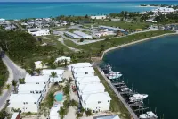 Treasure Cay Getaway with BOAT DOCK!  4 bedroom, pool, & bbq Cabana!