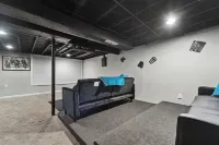 Updated Lansing Home | 4BR w Basement Theater Room