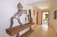 Tropical Golf View Villa. Steps to the ocean with a Gym and Theater-game room.