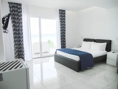 Boca Beach Residence Hotel Отели в г. 