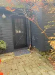 Cottage beside a waterfall