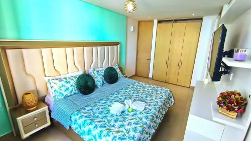 Experience beachfront luxury in Santa Marta: WiFi, pool, gym, and stunning views