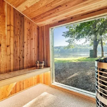 Riverfront Cabin with Cedar Wood Hot Tub, Dry Sauna, and Dock