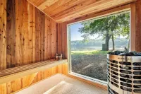 Riverfront Cabin with Cedar Wood Hot Tub, Dry Sauna, and Dock