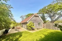 Beautiful modern barn conversion with south facing secluded patios and garden.