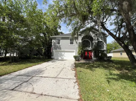 Charming 3-bedroom house with pool and hot tub in Kissimmee Отели рядом с достопримечательностью «Publix Super Market at Village Shops at Bellalago»