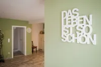 Ferienhaus Ambiente in Reil an der Mosel - Ferienwohnung Weinlust Hotels in Reil