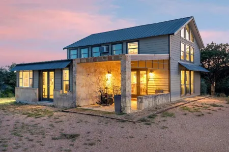 Escape to your private sanctuary nestled atop a serene hill with amazing views.