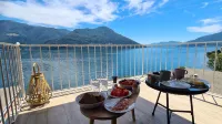 Fantastic view with vacation apartment Lago Maggiore, 80m2, 4 persons, renovated Hotels in Brissago
