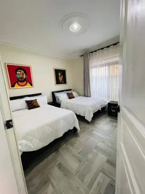 Asante Courts luxury at Namugongo, Kampala, Uganda. free wiifi, Netflix, parking Kyadondo住宿飯店