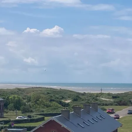 Roof top lighthouse and sea view