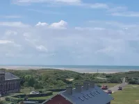 Roof top lighthouse and sea view