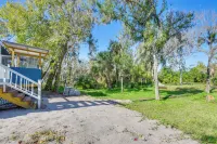 Outdoor Kitchen & Gaming Garage: Bradenton Retreat