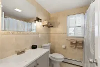 Stylish Seaside Home with Parking Beach Passes and 5-Minute Walk to the Beach