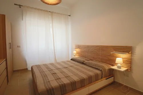 Casa Nausica Elegant Apartment Facing the Aragonese Castle - Bungalows
